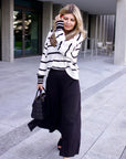 Striped sweater with polo collar