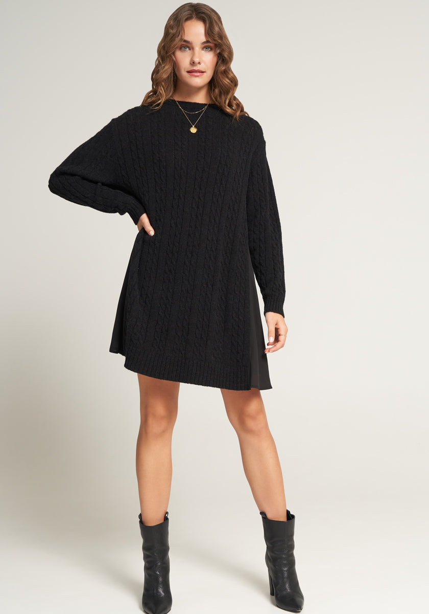 Short knitted dress with flowing insert on the back