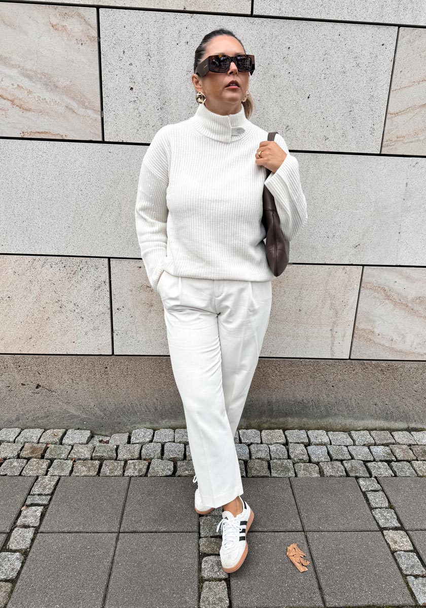 White sweater with decorative stand-up collar