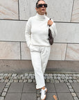 White sweater with decorative stand-up collar