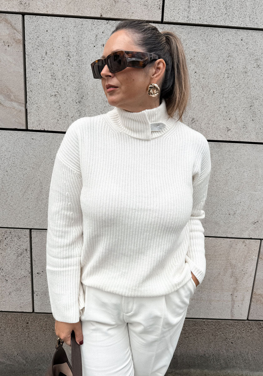 White sweater with decorative stand-up collar