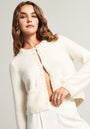 White cardigan with pearl decoration