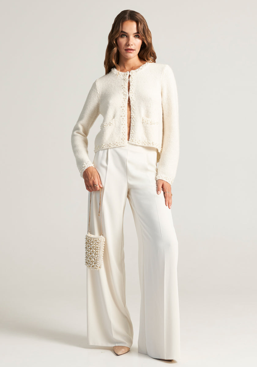 White cardigan with pearl decoration