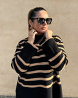 Striped knitted sweater with stand-up collar