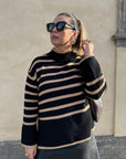 Striped knitted sweater with stand-up collar