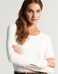 White long-sleeved shirt with cuff decoration