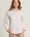 Beige striped shirt with decoration