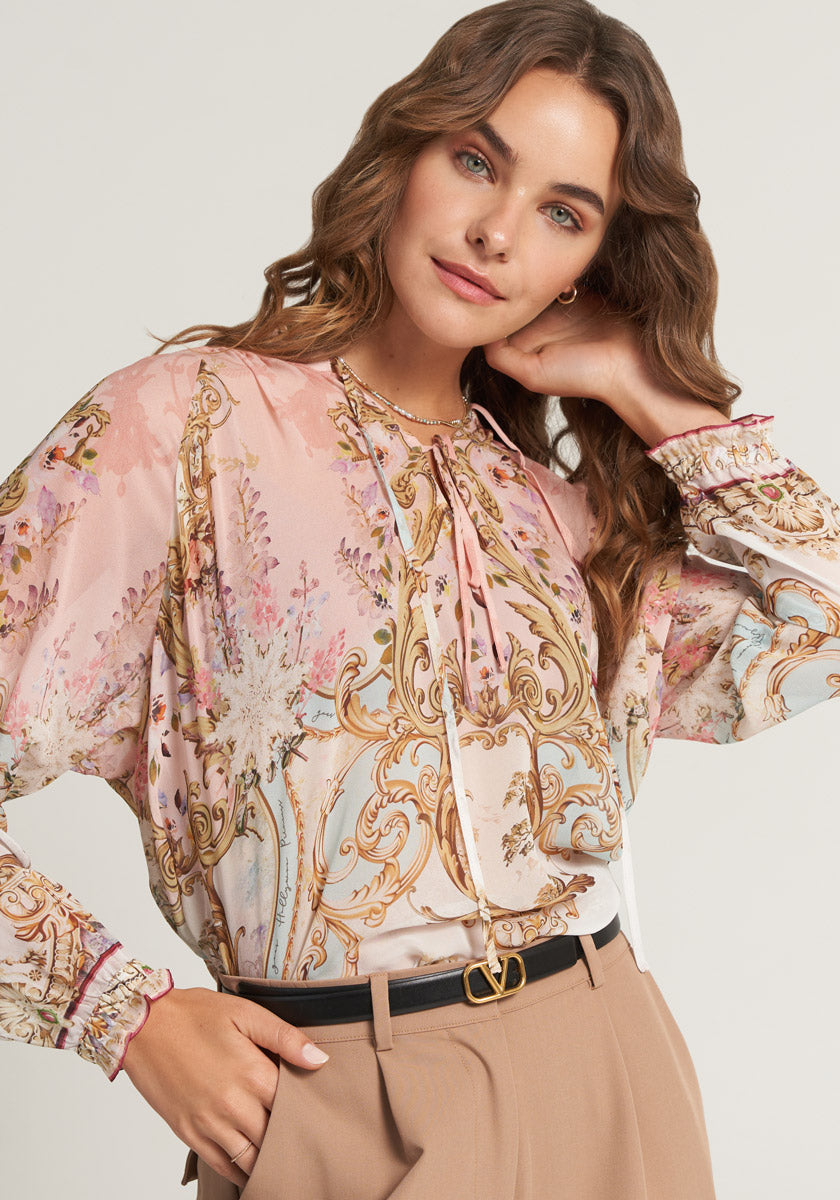 Silk blouse with ornamental print and ruffles