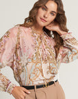 Silk blouse with ornamental print and ruffles