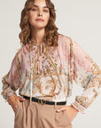 Silk blouse with ornamental print and ruffles