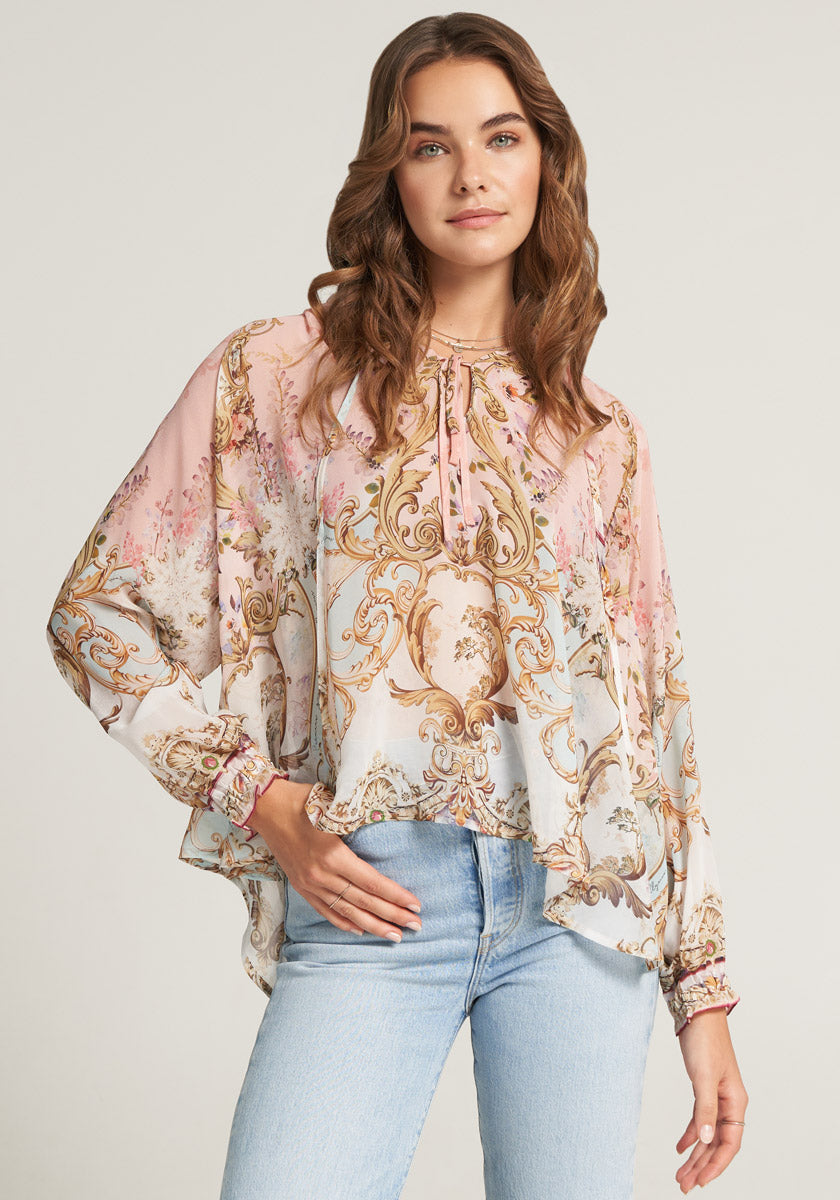 Silk blouse with ornamental print and ruffles