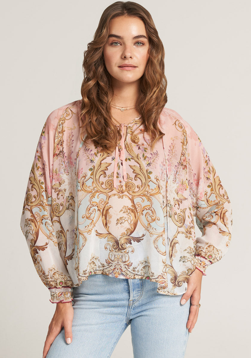 Silk blouse with ornamental print and ruffles