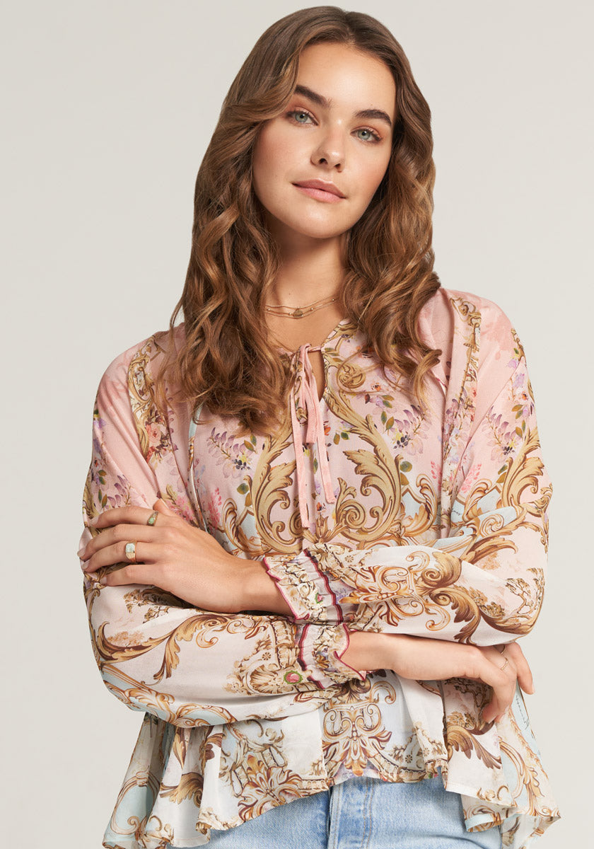 Silk blouse with ornamental print and ruffles