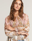 Silk blouse with ornamental print and ruffles