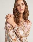 Silk blouse with ornamental print and ruffles