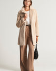 Beige faux fur coat