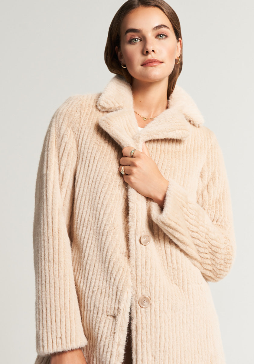 Beige faux fur coat