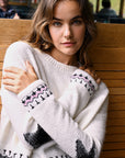 White jacquard sweater with star and decoration