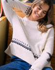 White jacquard sweater with star and decoration