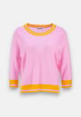 Pink cashmere sweater with orange contrast stripes