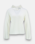 White sweater with decorative stand-up collar