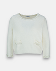 Knitted sweater with pearl decoration