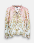 Silk blouse with ornamental print and ruffles