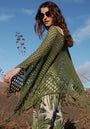 Poncho with net pattern and fringes