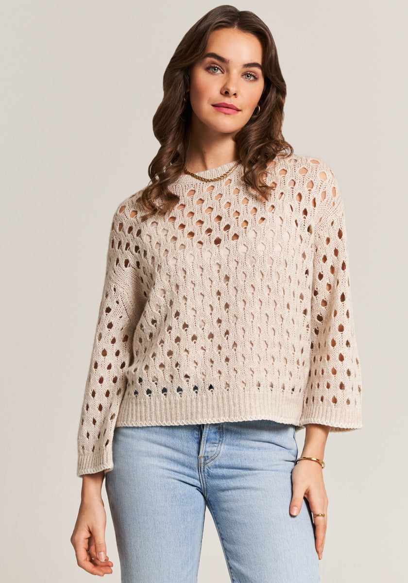 sweater with large hole pattern