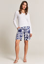 Blue linen shorts with floral print